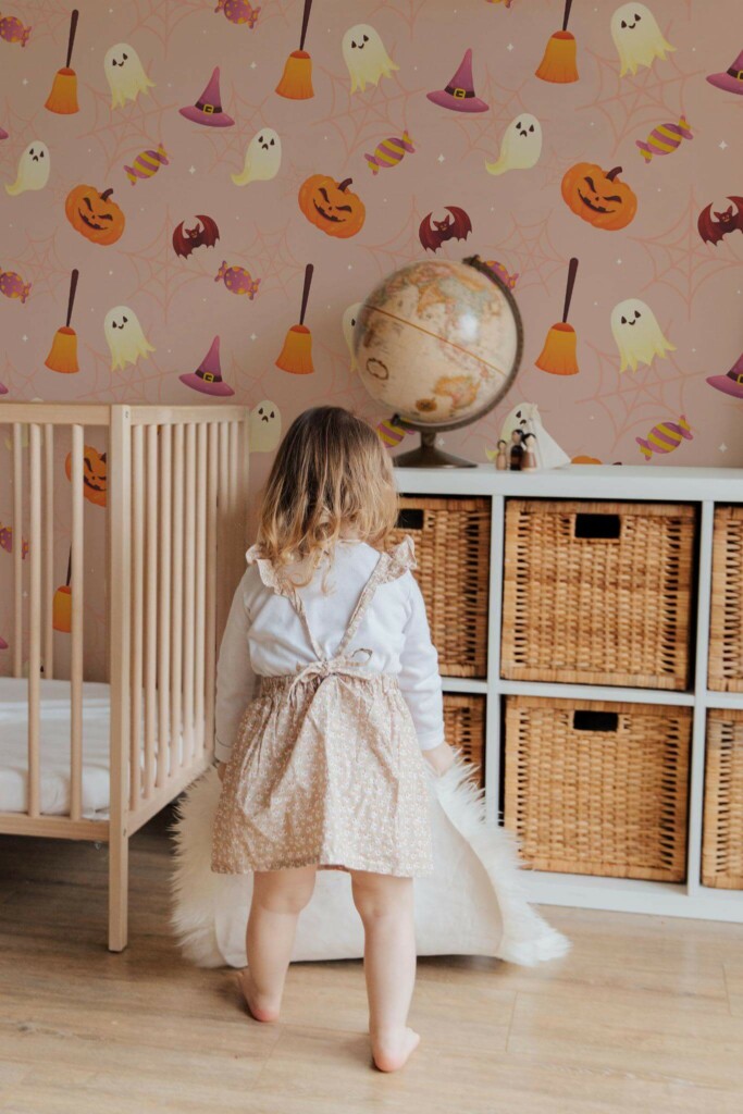 Gender neutral style kids room decorated with Pink halloween peel and stick wallpaper