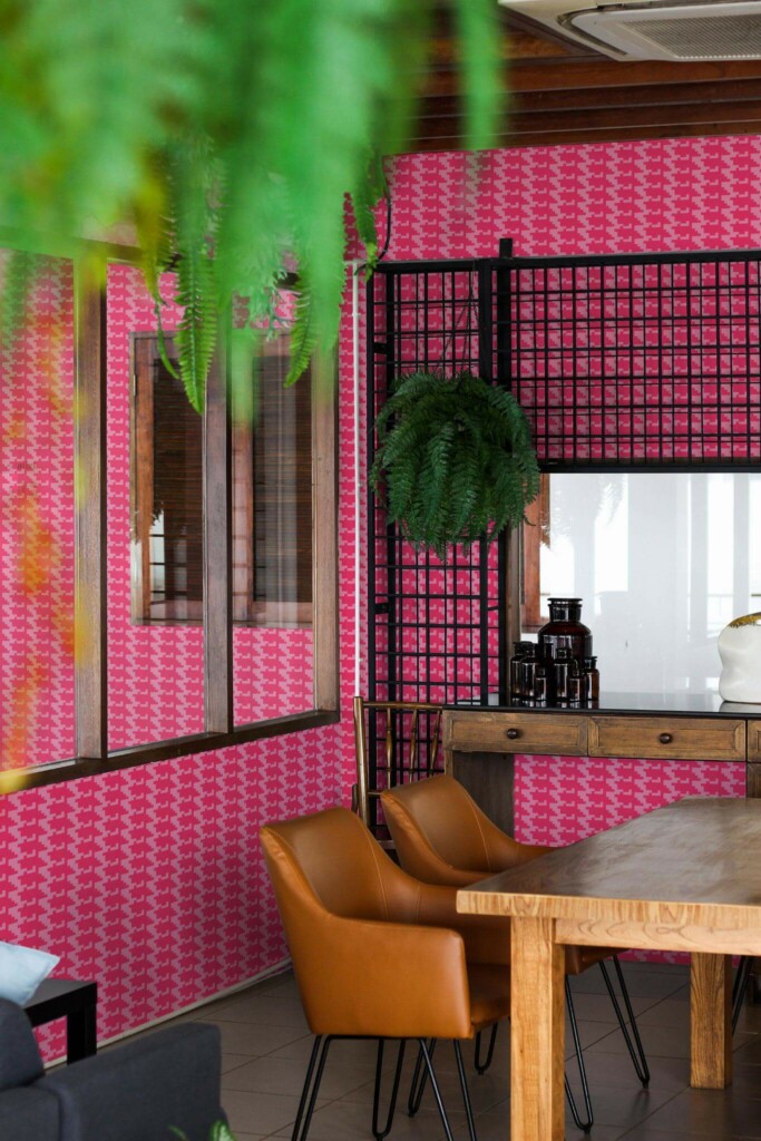 Mid-century modern style dining room decorated with Pink houndstooth peel and stick wallpaper and black industrial accents