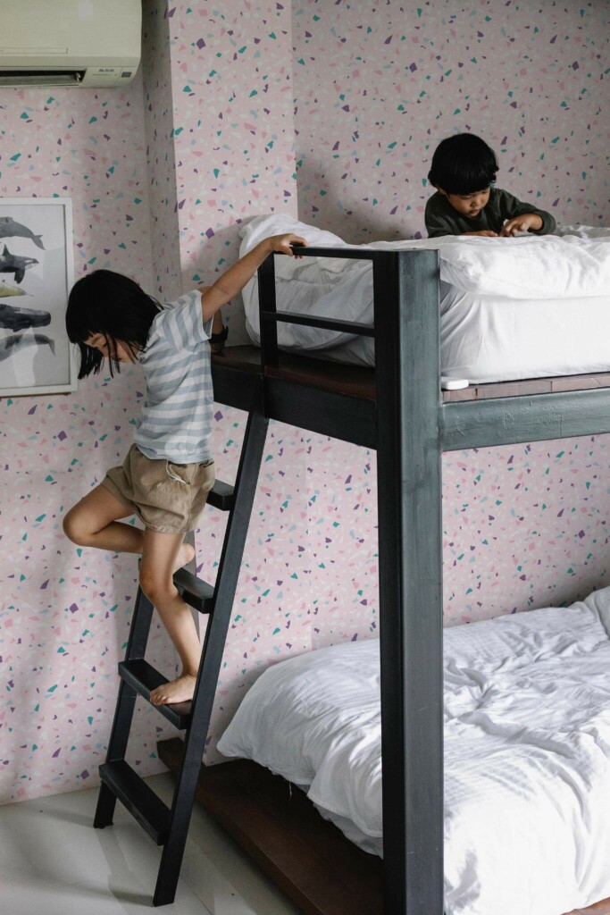 Minimalistic style kids room decorated with Pink terrazzo peel and stick wallpaper