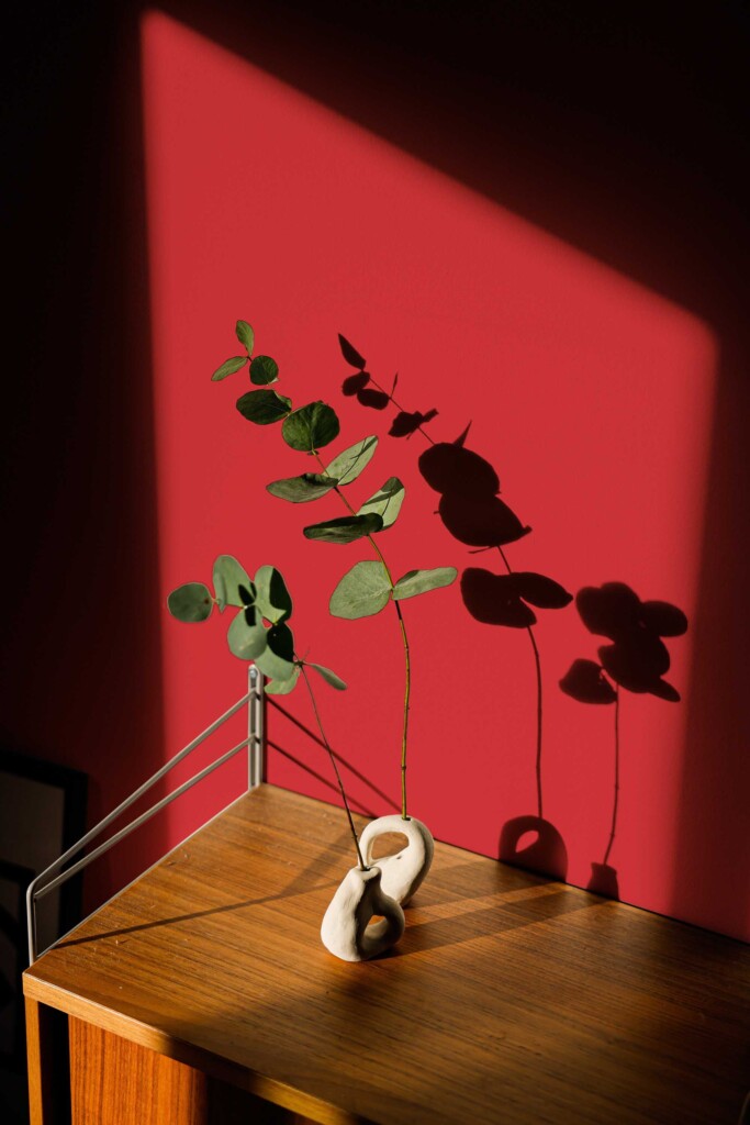 Self-adhesive wallpaper in deep red by Fancy Walls with solid minimalist tone and matte finish