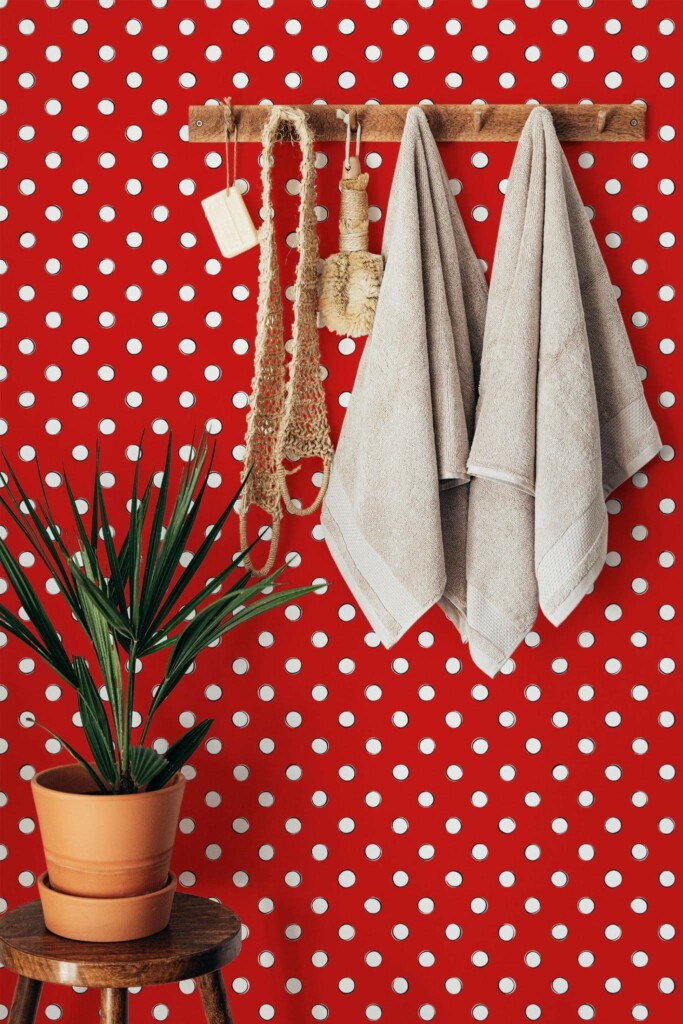 Boho style bathroom decorated with Red and white polka dots peel and stick wallpaper