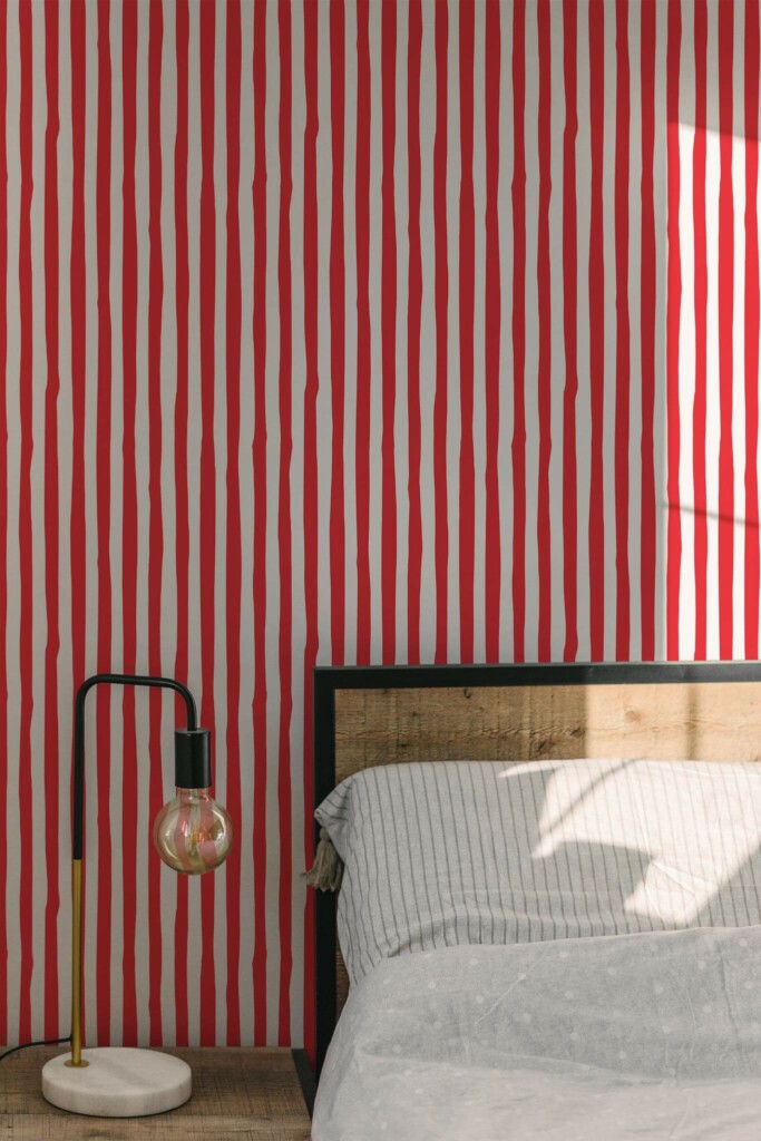 Minimal modern style bedroom decorated with Red handdrawn stripes peel and stick wallpaper