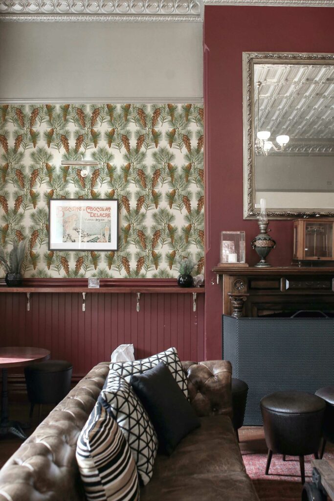 Traditional wallpaper with vintage pine pattern by Fancy Walls