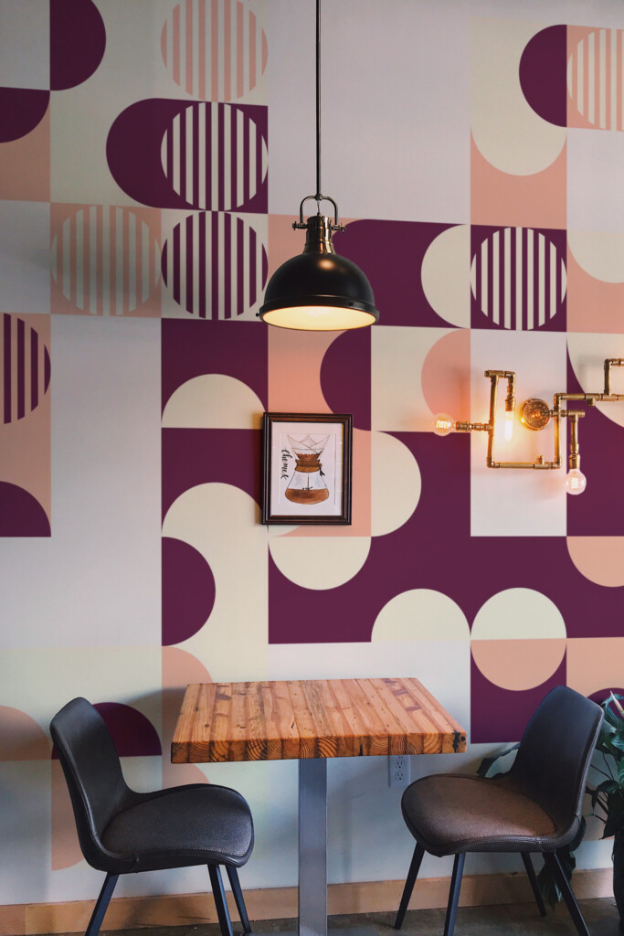 A wall mural peel and stick design featuring abstract Bauhaus-inspired shapes in rich burgundy and peach hues brings a timeless retro vibe to any kitchen wall. The Fancy Walls peel and stick or non-pasted wallpaper.