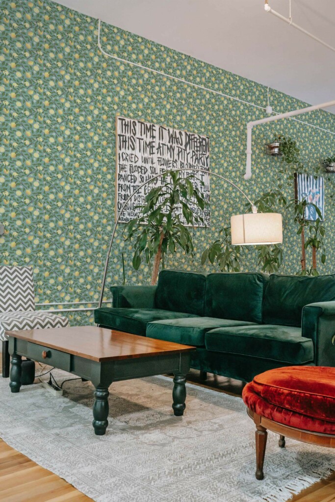 Bold eclectic style living room decorated with Sage lemon peel and stick wallpaper and emerald green sofa