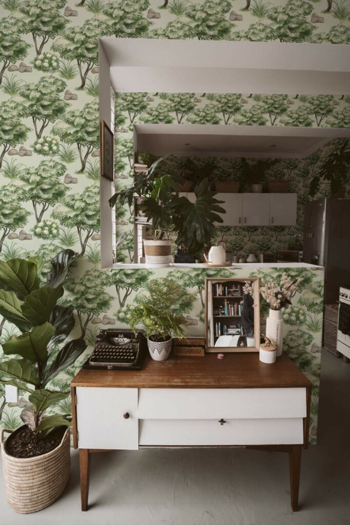 Boho style living room and kitchen decorated with Scenic tree peel and stick wallpaper and green plants