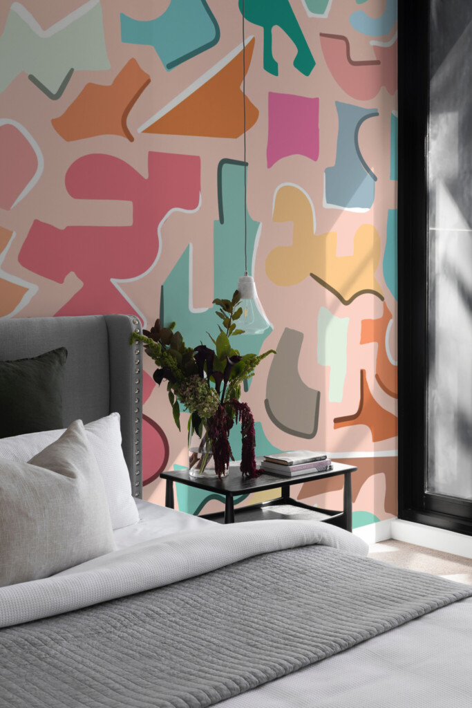 Fancy Walls removable wall mural showing playful doodle shapes in vibrant colors over soft peach