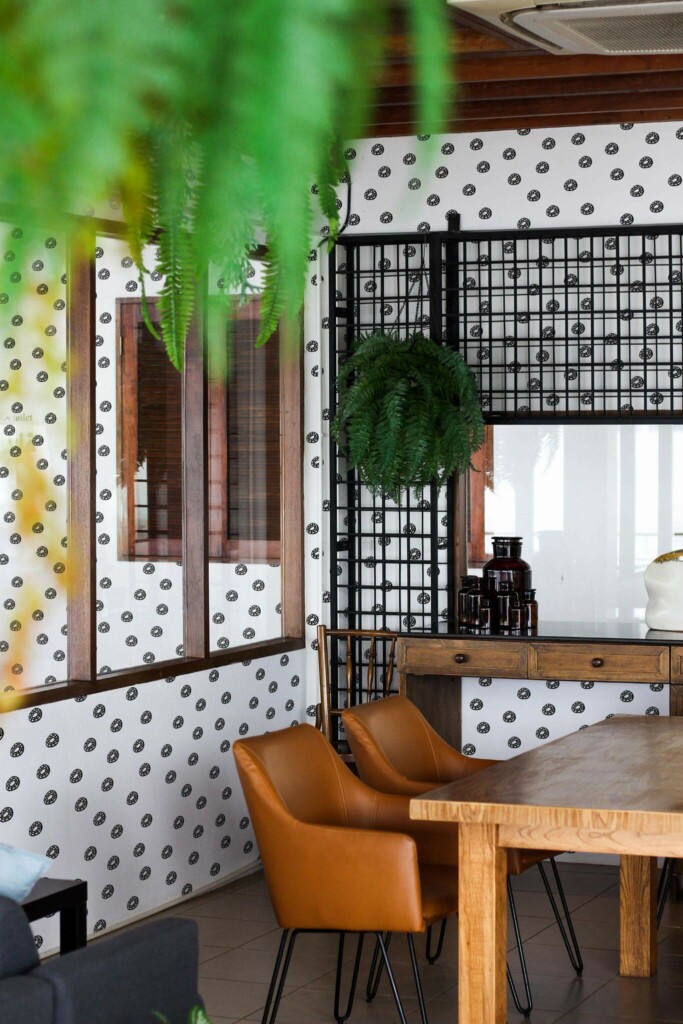 Mid-century modern style dining room decorated with Small abstract circle peel and stick wallpaper and black industrial accents