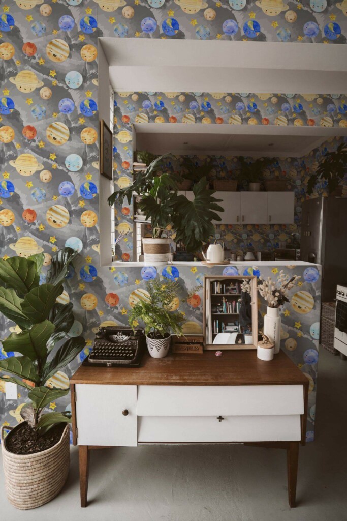 Boho style living room and kitchen decorated with Solar system peel and stick wallpaper and green plants