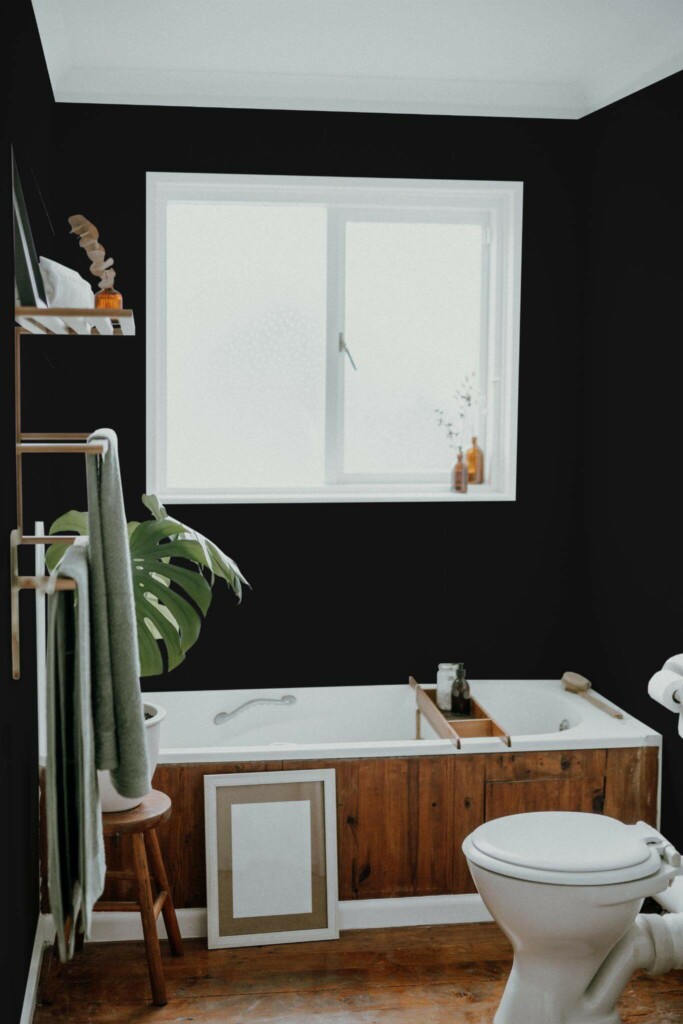 Boho farmhouse style bathroom decorated with Solid black peel and stick wallpaper