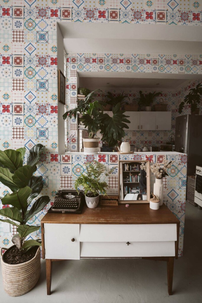 Boho style living room and kitchen decorated with Spanish Tile peel and stick wallpaper and green plants