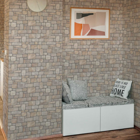 old stone bricks pattern in hallway. Peel and stick or non-pasted wallpaper