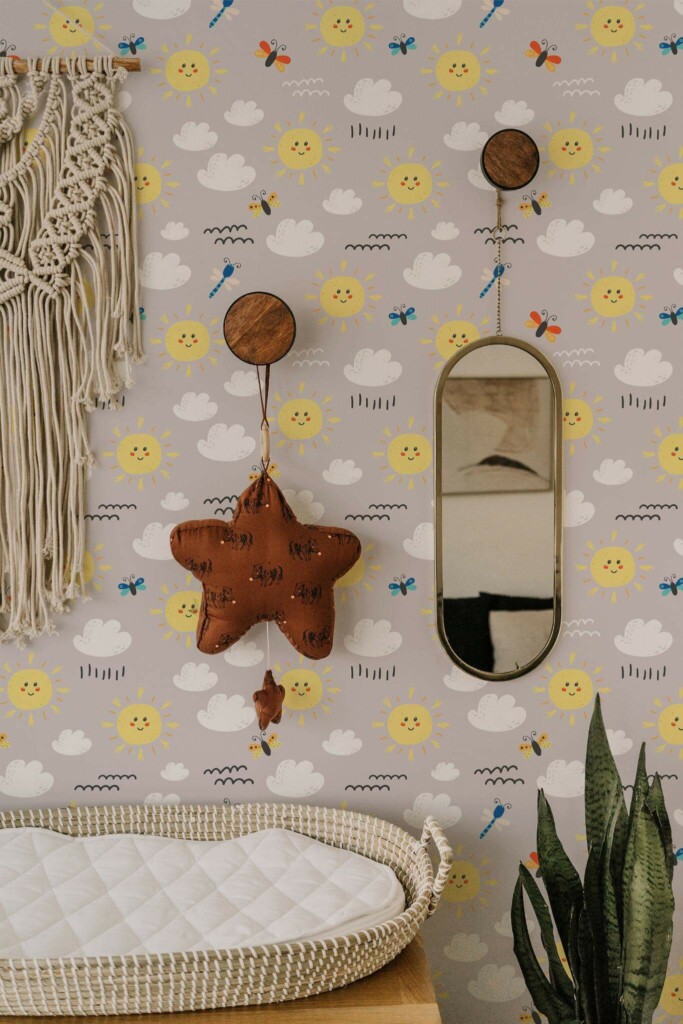 Boho style neutral nursery decorated with Sun and clouds peel and stick wallpaper