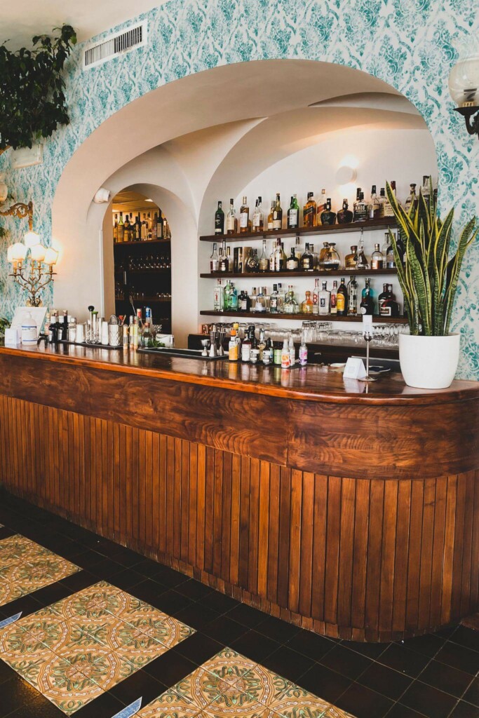 Mid-century modern style bar decorated with Teal retro damask peel and stick wallpaper