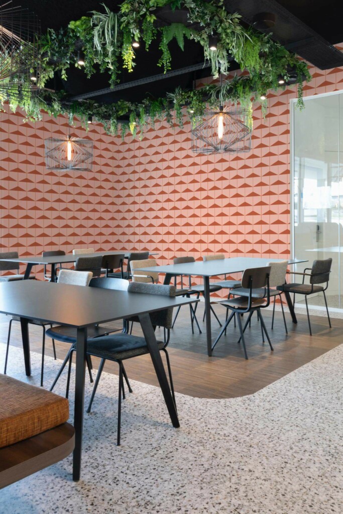 Modern style cafe decorated with Terracotta triangles on pink peel and stick wallpaper
