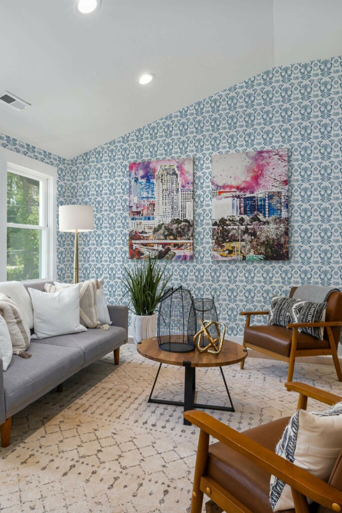 Mid-century modern style living room decorated with Vintage blue damask floral peel and stick wallpaper and colorful funky artwork