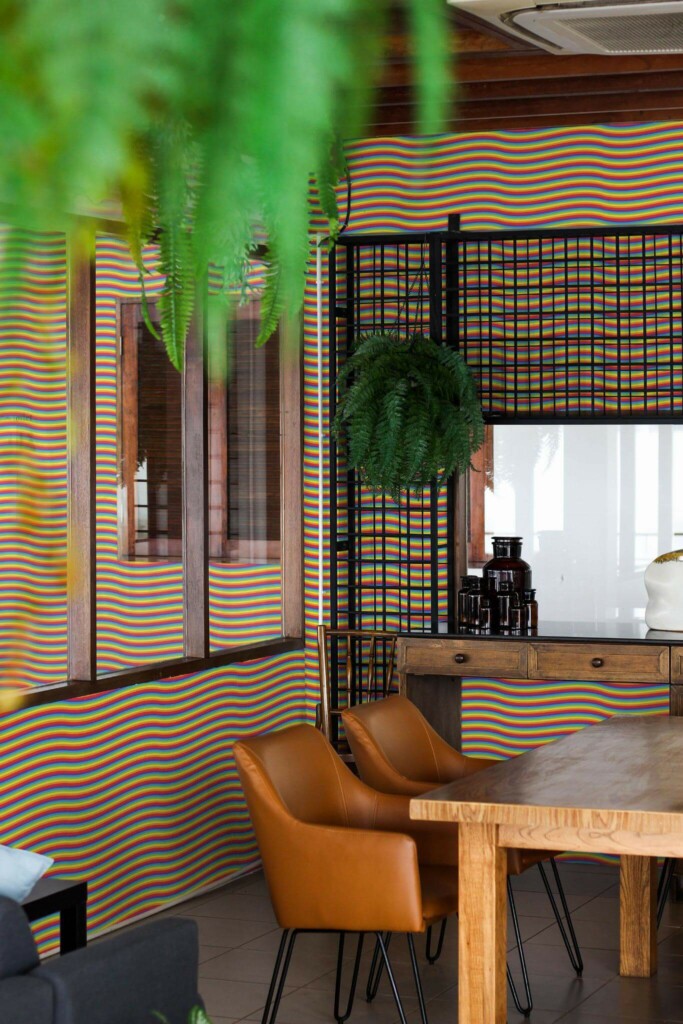 Mid-century modern style dining room decorated with Wavy rainbow peel and stick wallpaper and black industrial accents