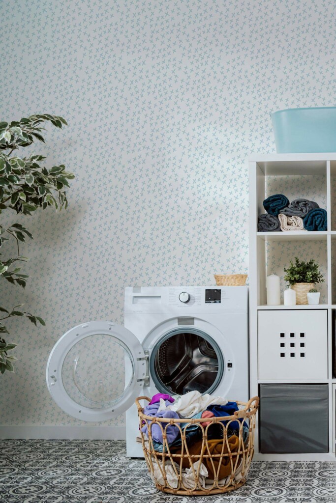 Minimal scandinavian style laundry room decorated with Whimsical x cross pattern peel and stick wallpaper