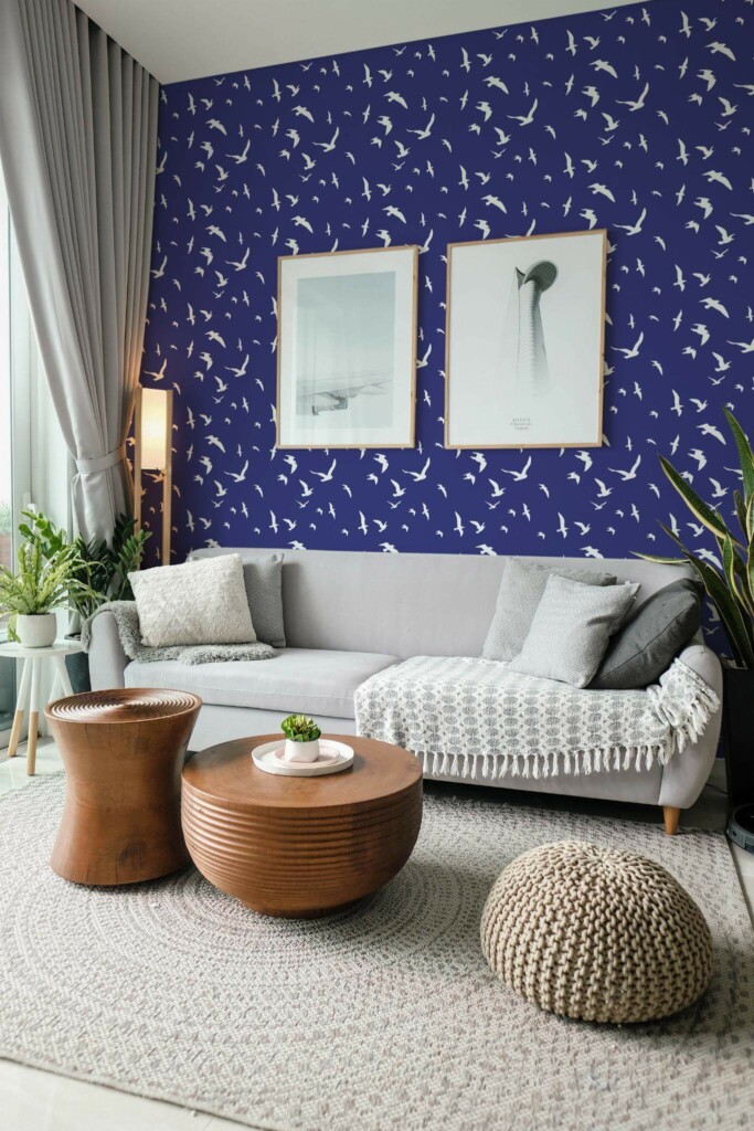 Modern scandinavian style living room decorated with White birds peel and stick wallpaper and green plants