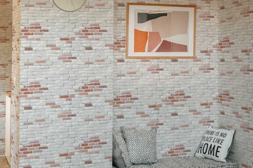 white bricks with red elements pattern, brick look texture imitation wallpaper in a hallway interior. Peel and stick or non-pasted