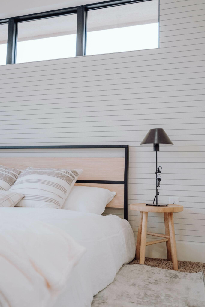 Scandinavian style bedroom decorated with White lines peel and stick wallpaper