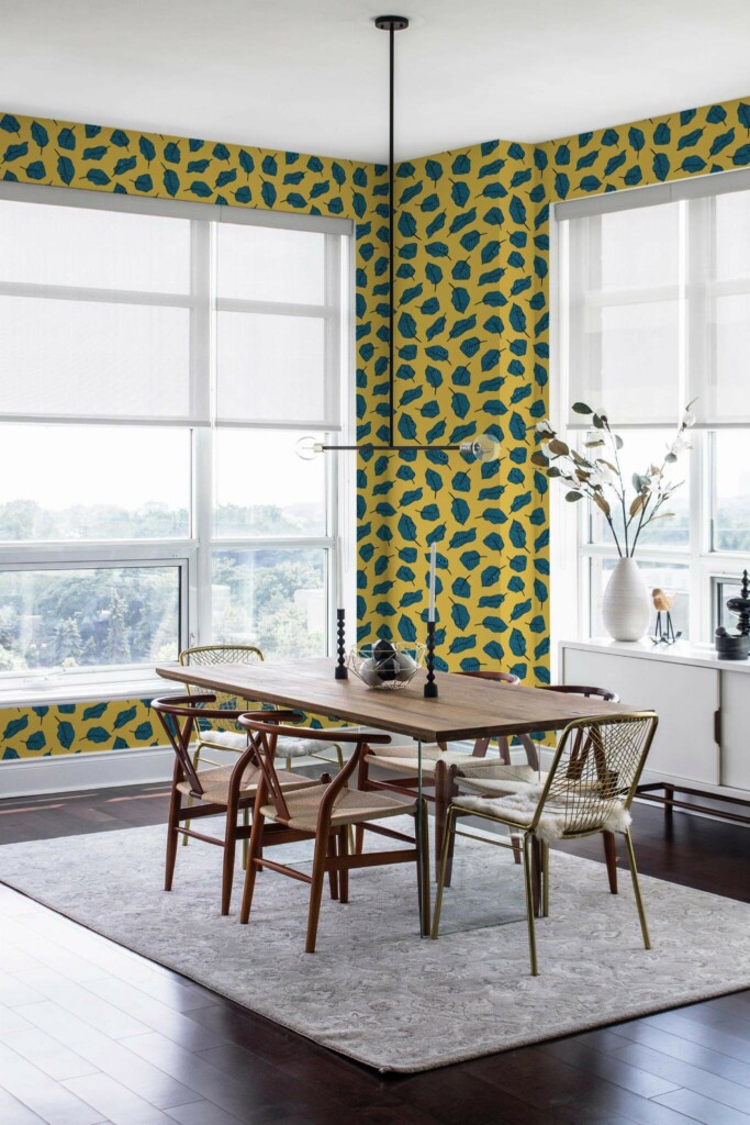 Modern minimalist style dining room decorated with Yellow and blue bold leaf peel and stick wallpaper