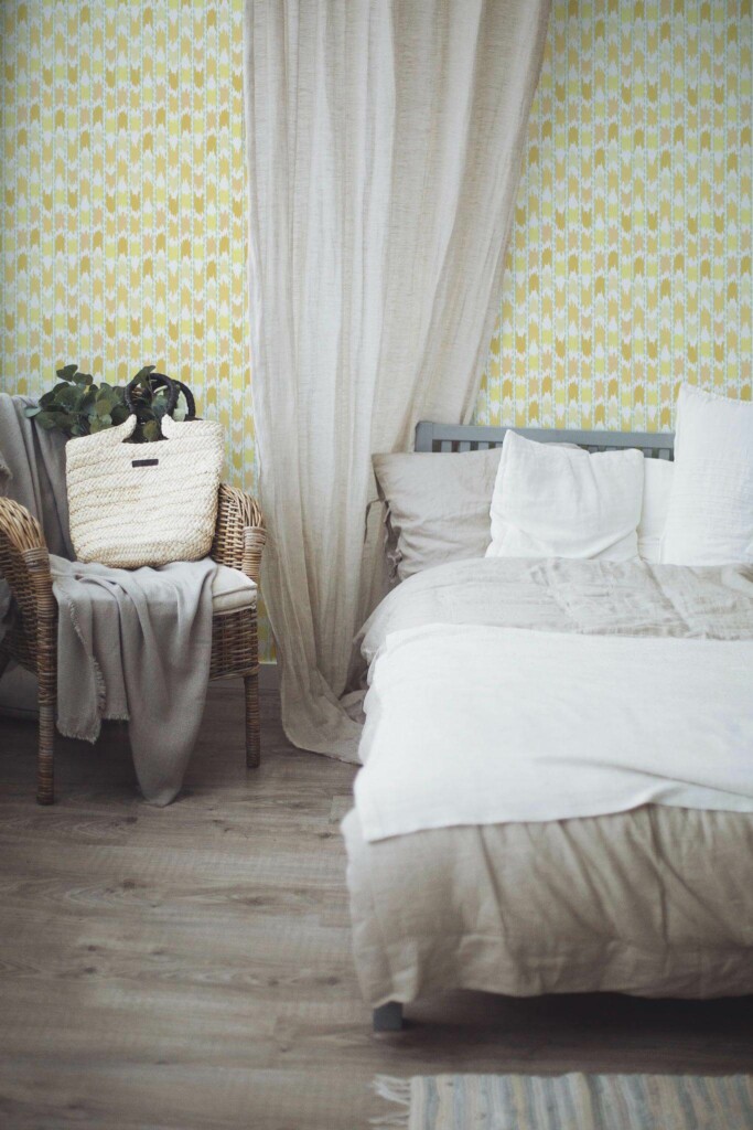 Boho style bedroom decorated with Yellow ikat peel and stick wallpaper