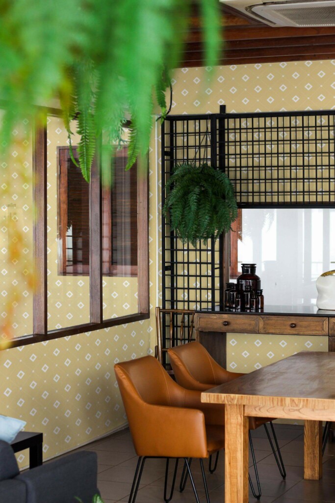 Mid-century modern style dining room decorated with Yellow square peel and stick wallpaper and black industrial accents